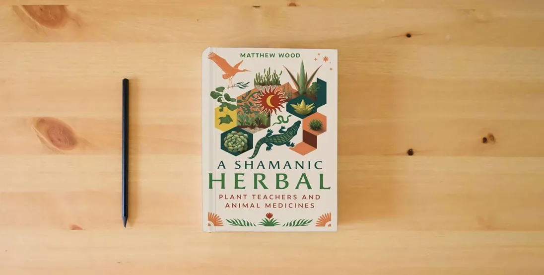 The book A Shamanic Herbal: Plant Teachers and Animal Medicines} is on the table