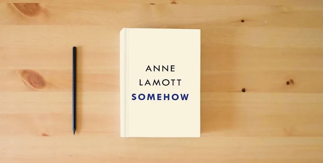 The book Somehow: Thoughts on Love} is on the table