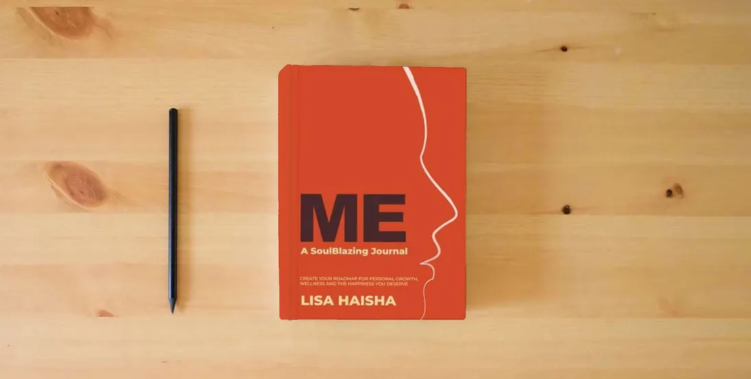 The book ME: A SoulBlazing Journal: Create Your Roadmap for Personal Growth, Wellness and the Happiness You Deserve} is on the table