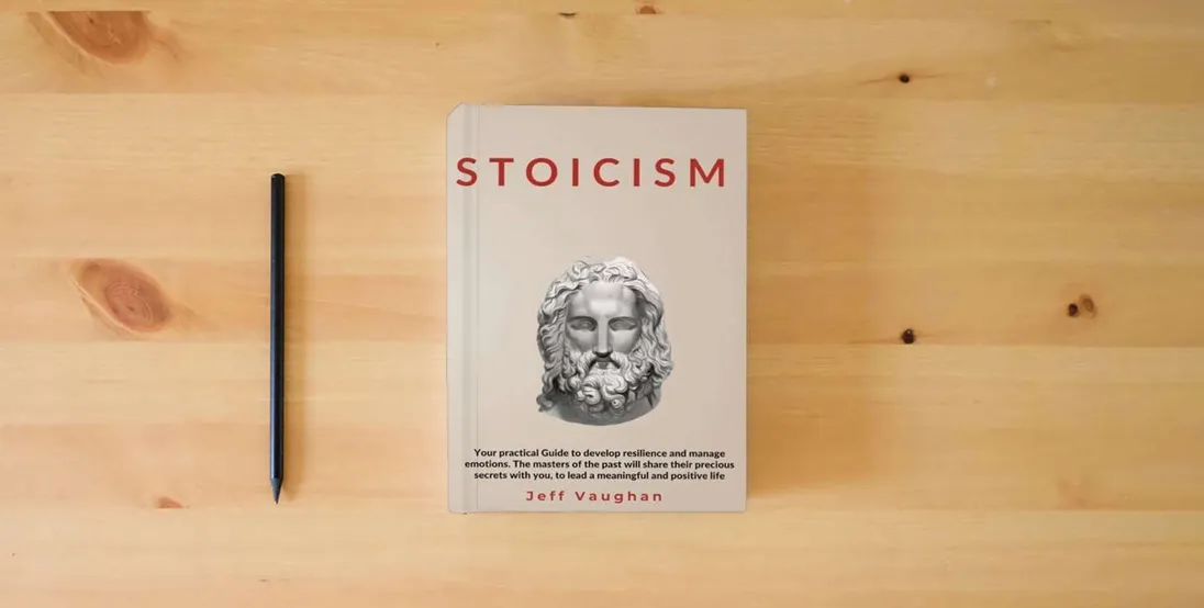 The book STOICISM: Your practical Guide to develop resilience and manage emotions. The masters of the past will share their precious secrets with you, to lead a meaningful and positive life} is on the table