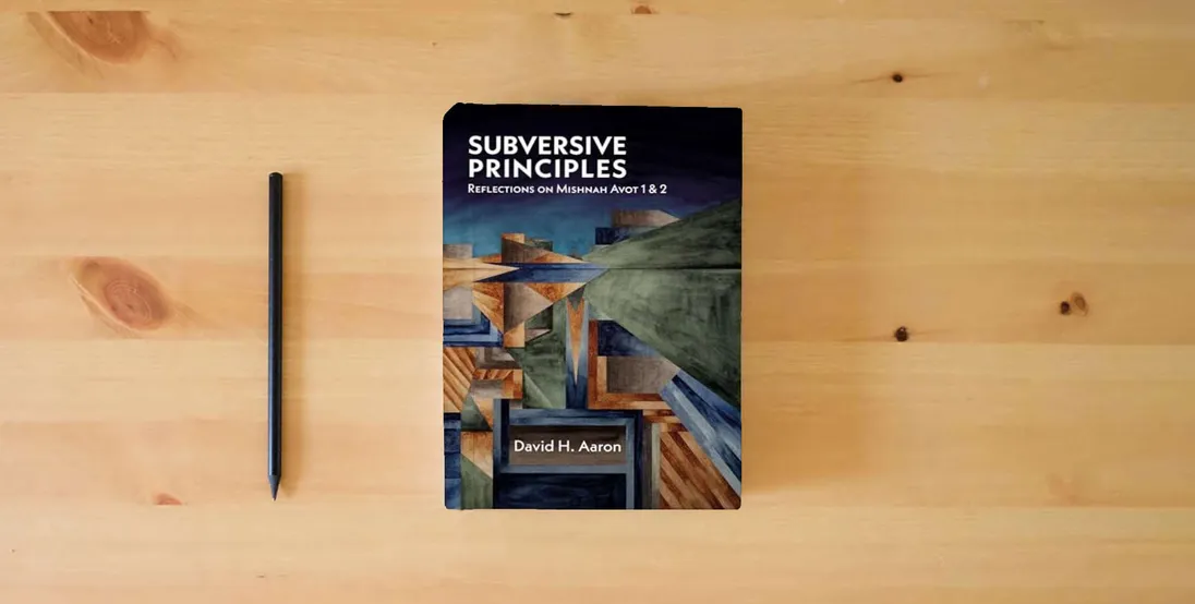The book Subversive Principles: Reflections on Mishnah Avot 1 & 2} is on the table