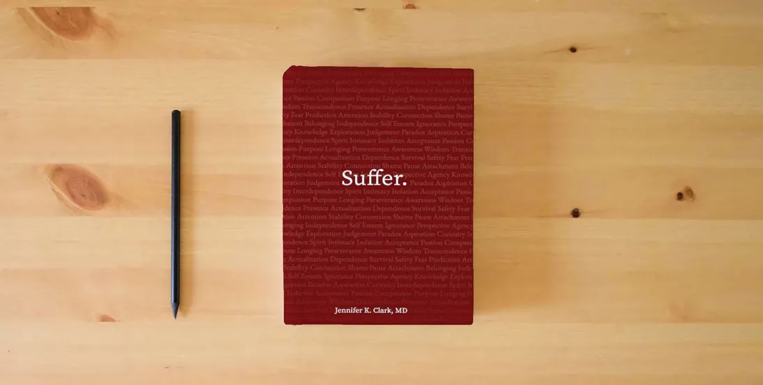 The book Suffer.} is on the table