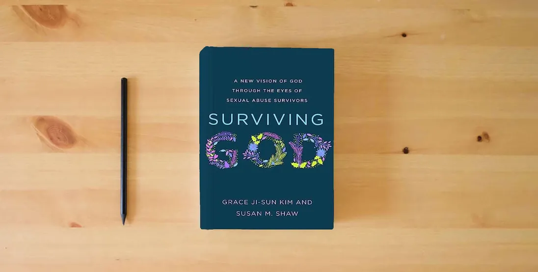 The book Surviving God: A New Vision of God through the Eyes of Sexual Abuse Survivors} is on the table