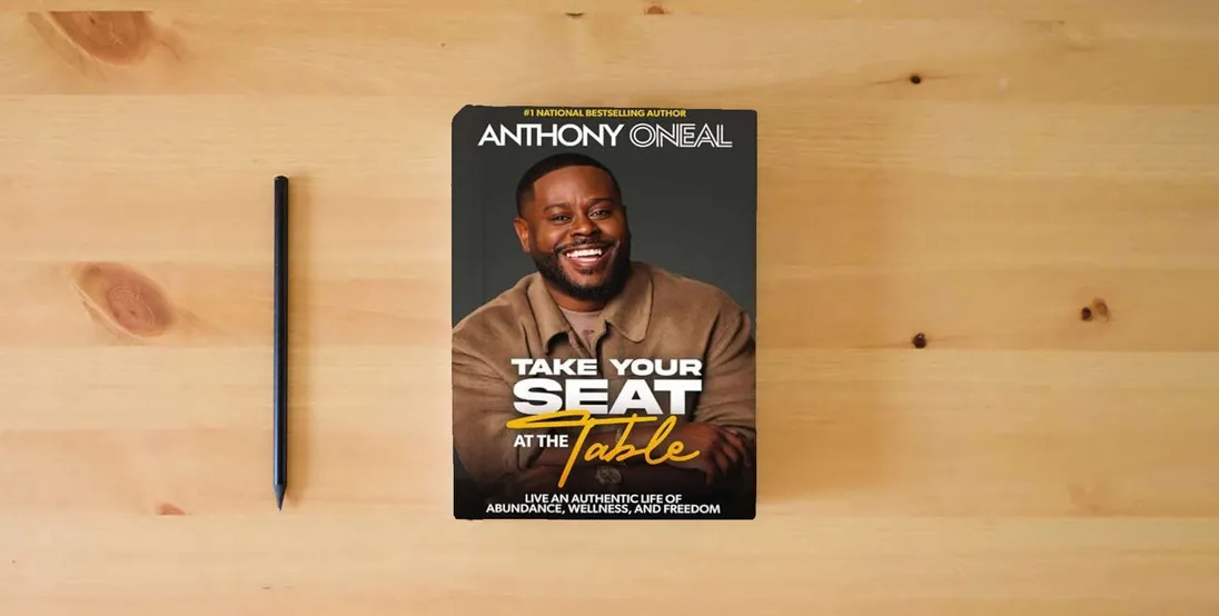 The book Take Your Seat at the Table: Live an Authentic Life of Abundance, Wellness, and Freedom} is on the table