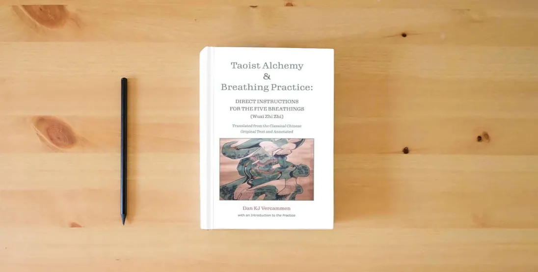 The book Taoist Alchemy and Breathing Practice: Direct Instructions for the Five Breathings} is on the table