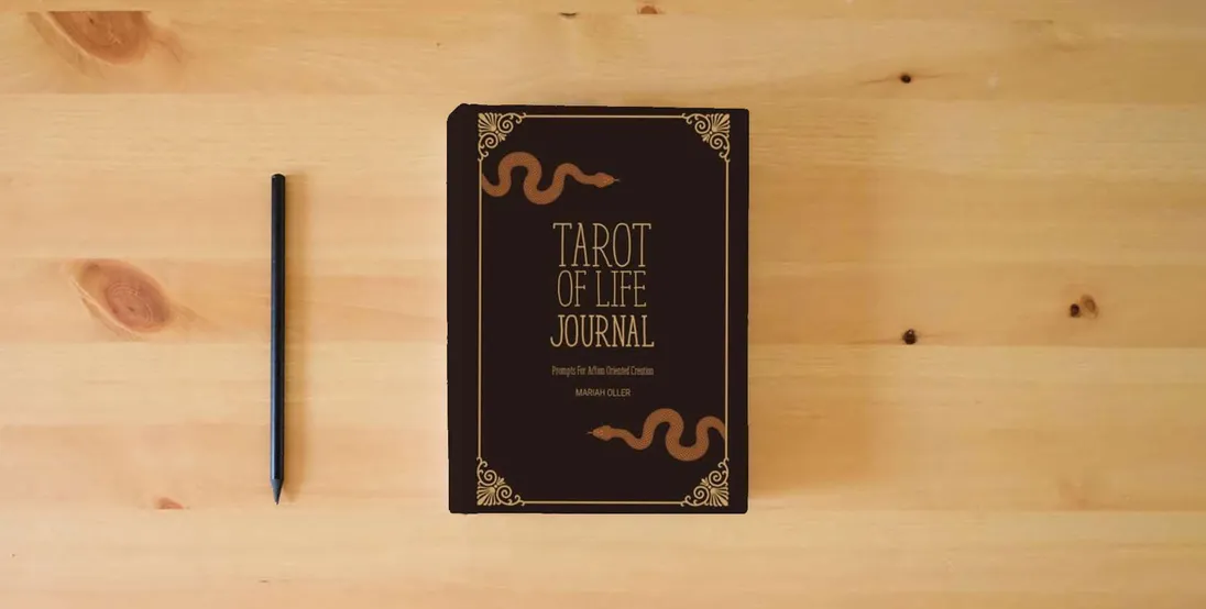 The book Tarot of Life Journal: Prompts For Action Oriented Creation} is on the table