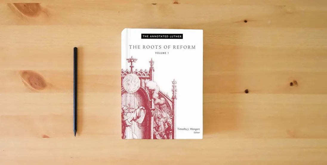 The book The Annotated Luther, Volume 1: The Roots of Reform} is on the table
