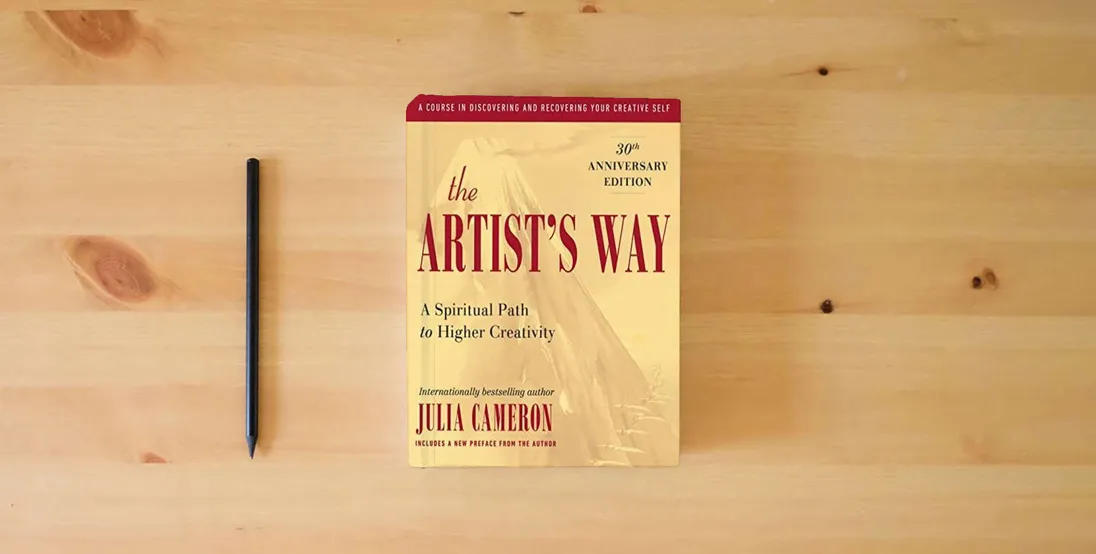 The book The Artist's Way: 30th Anniversary Edition} is on the table