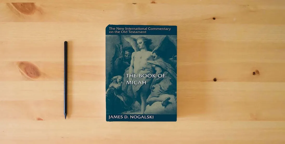 The book The Book of Micah (The New International Commentary on the Old Testament)} is on the table