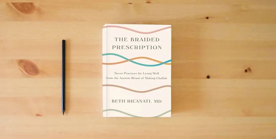 The book The Braided Prescription: Seven Practices for Living Well from the Ancient Ritual of Making Challah} is on the table