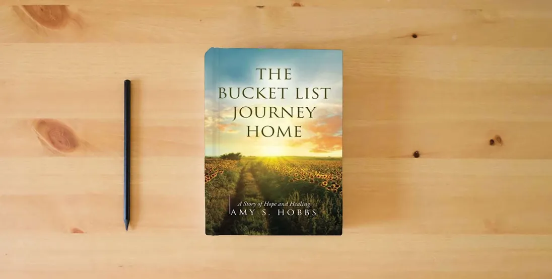 The book The Bucket List Journey Home: A Story of Hope and Healing} is on the table