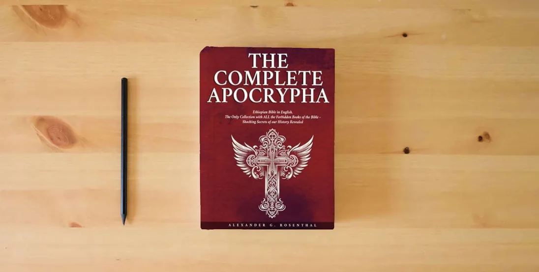 The book The Complete Apocrypha: Ethiopian Bible in English – The Only Collection With ALL the Forbidden Books of the Bible – Shocking Secrets of Our History Revealed} is on the table