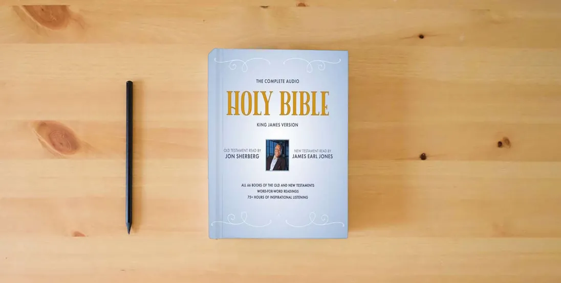 The book The Complete Audio Holy Bible: King James Version: The New Testament as Read by James Earl Jones; The Old Testament as Read by Jon Sherberg} is on the table
