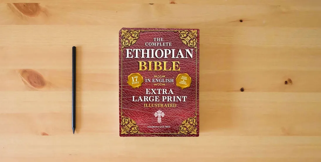 The book The Complete Ethiopian Bible in English (Extra-Large Print 17-Point Font, Illustrated) Includes Missing Apocrypha, Book of Enoch, Ezras, Jubilees, Meqabyan, Book of Wisdom, & Other Orthodox Lost Books} is on the table