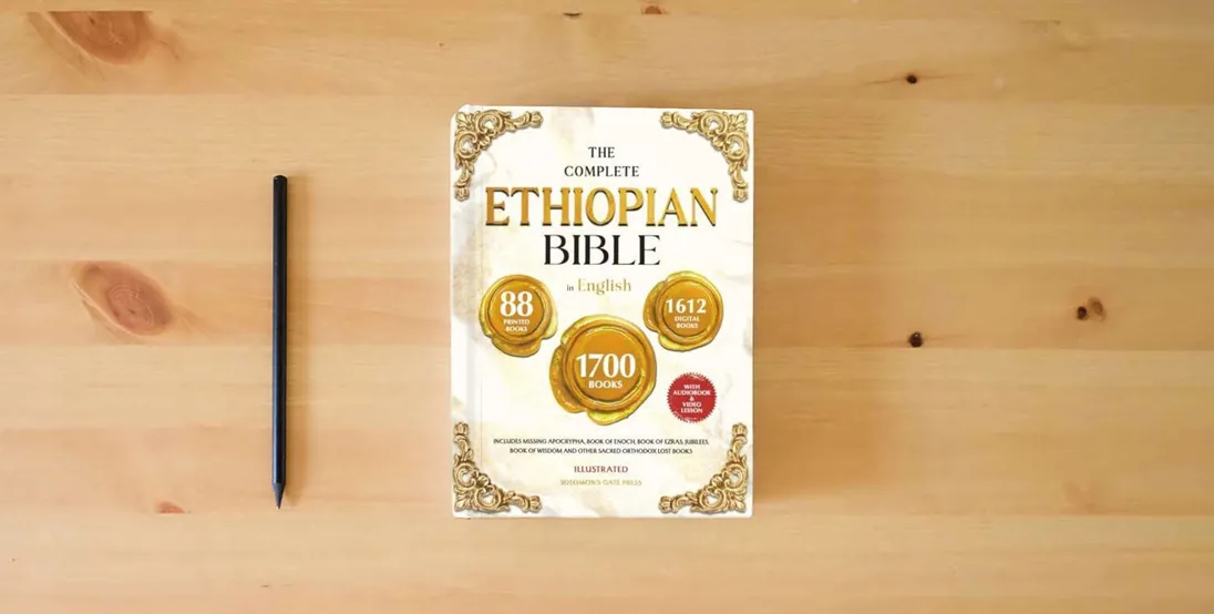 The book THE COMPLETE ETHIOPIAN BIBLE IN ENGLISH Illustrated: Includes Missing Apocrypha, Book of Enoch, Book of Ezras, Jubilees, Book of Wisdom and Other Sacred Orthodox Lost Books} is on the table