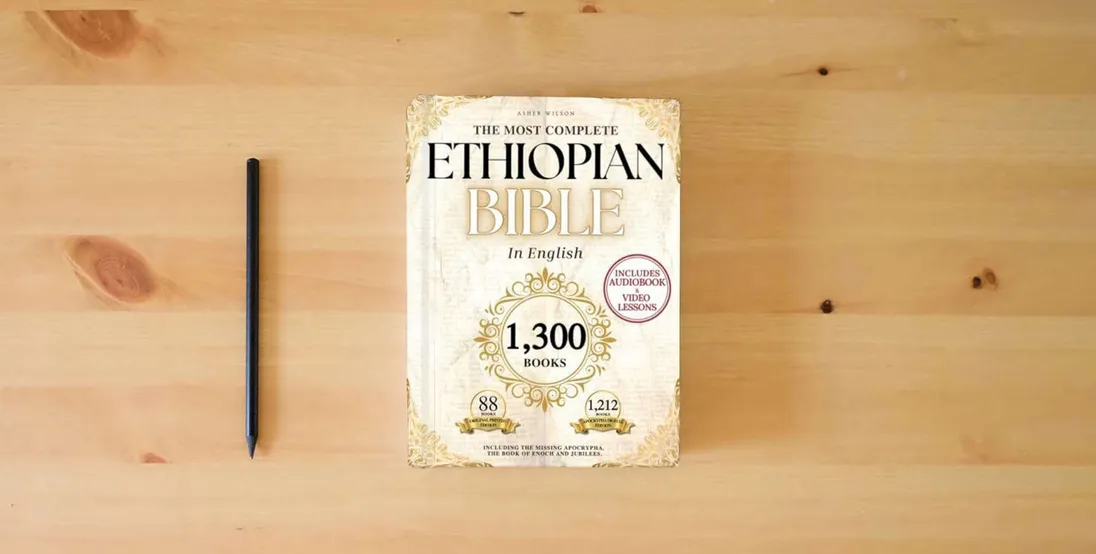 The book THE COMPLETE ETHIOPIAN BIBLE in English 88 Scriptures: including Missing Apocrypha, Book of Enoch, Jubilees.} is on the table