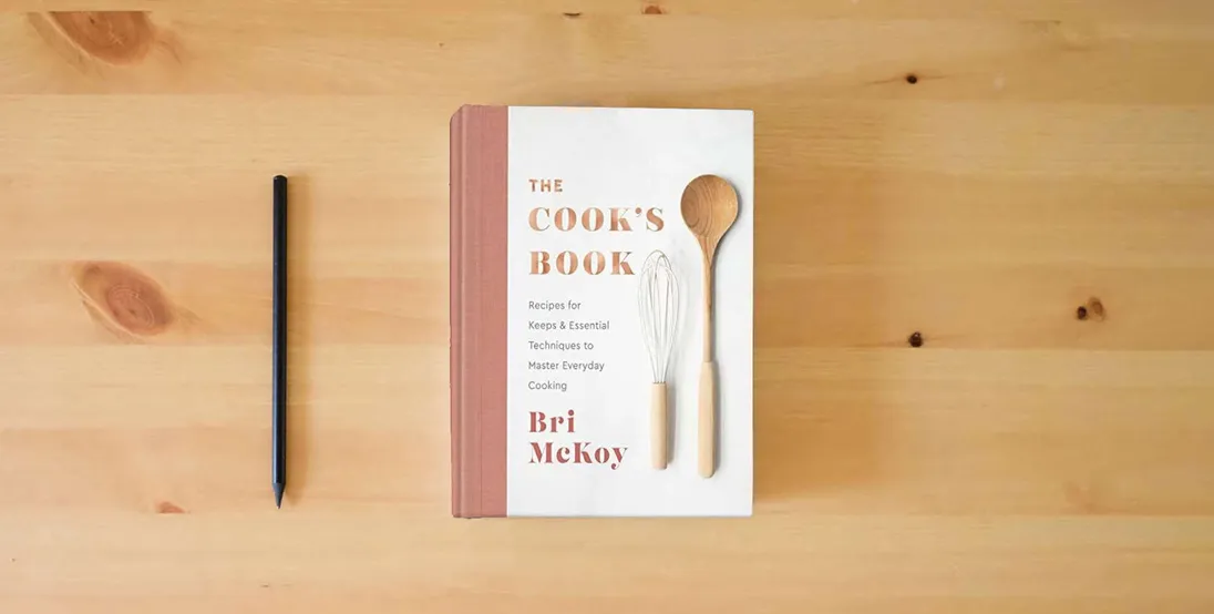 The book The Cook's Book: Recipes for Keeps & Essential Techniques to Master Everyday Cooking} is on the table