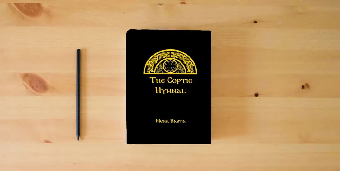 The book The Coptic Hymnal} is on the table