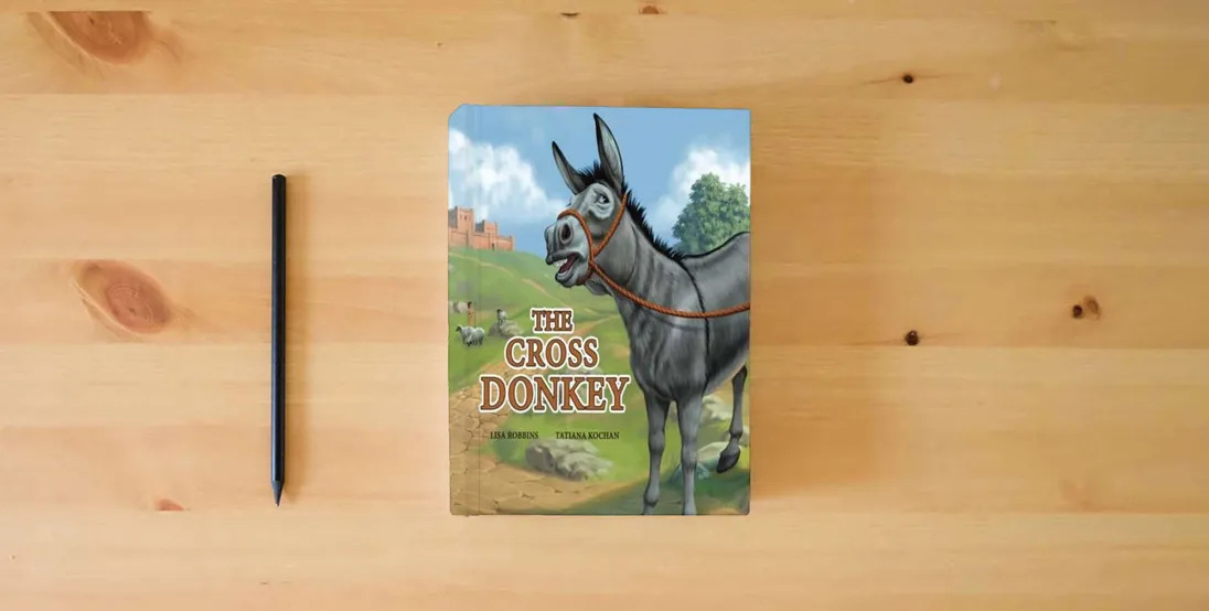 The book The Cross Donkey} is on the table