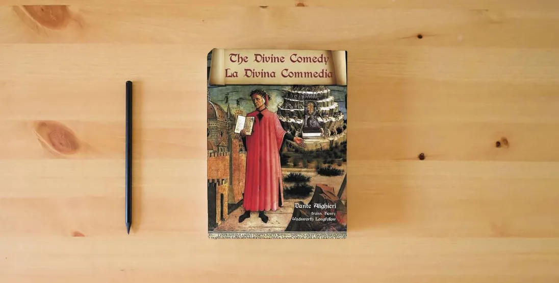 The book The Divine Comedy / La Divina Commedia - Parallel Italian / English Translation} is on the table