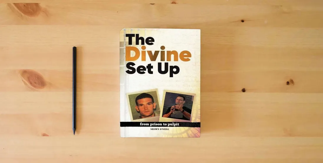 The book The Divine Set Up: From Prison to Pulpit} is on the table
