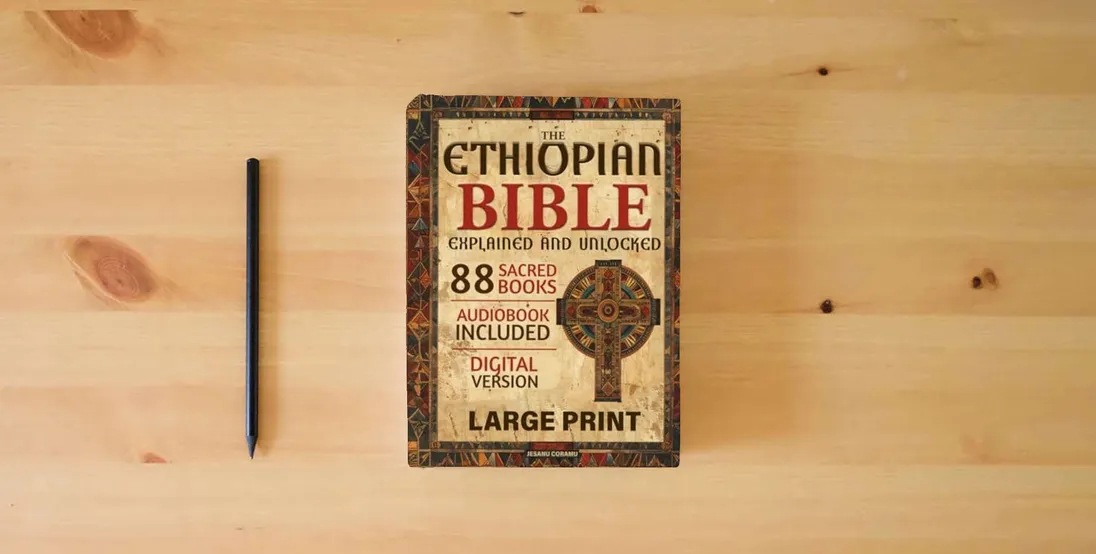 The book The Ethiopian Bible Explained and Unlocked: The Complete 88 Sacred Books in English with Enoch, Jubilees, and Apocrypha – A Guided Edition with Commentary, Context, and Spiritual Insights.} is on the table