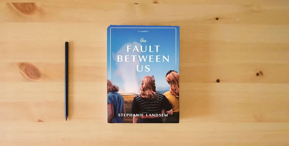 The book The Fault Between Us} is on the table