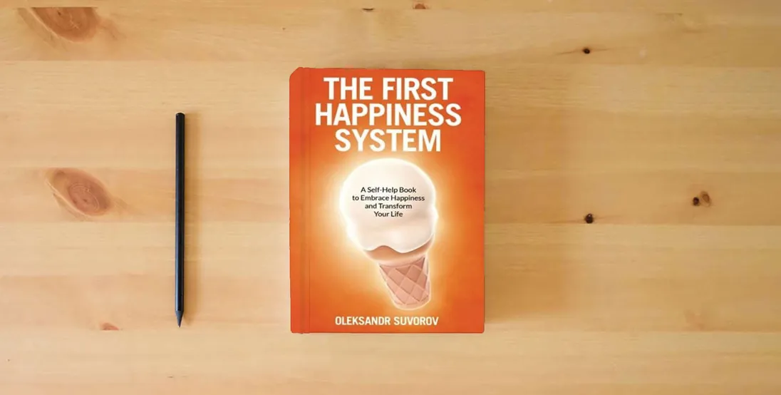 The book The First Happiness System: A Self-Help Book to Embrace Happiness and Transform Your Life} is on the table