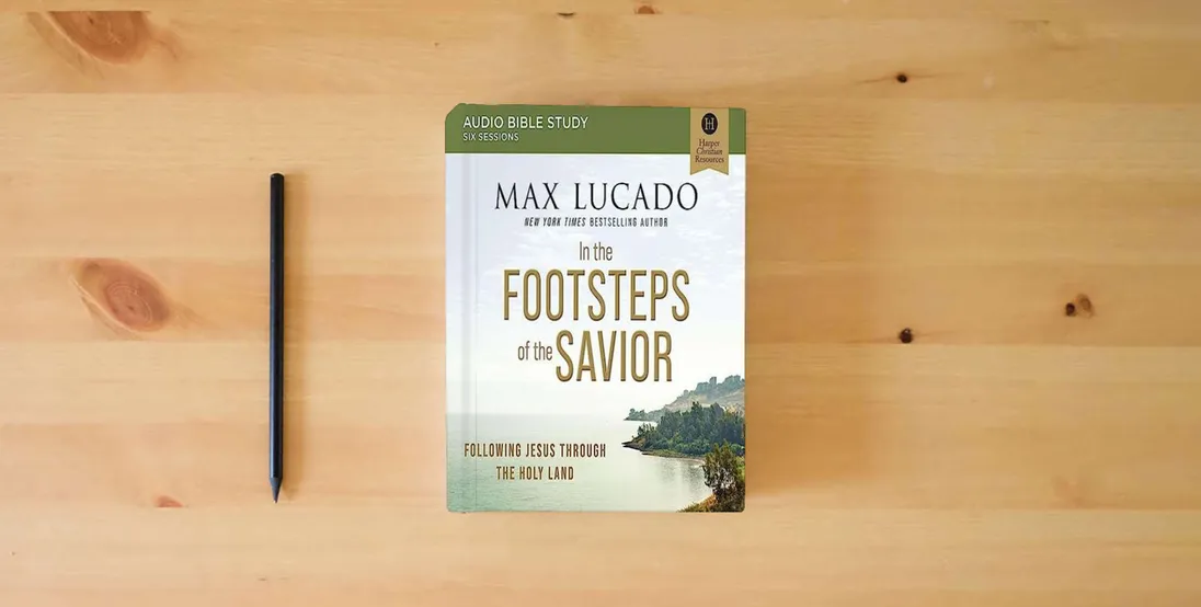 The book In the Footsteps of the Savior: Audio Bible Studies: Following Jesus Through the Holy Land (Audio Bible Studies)} is on the table
