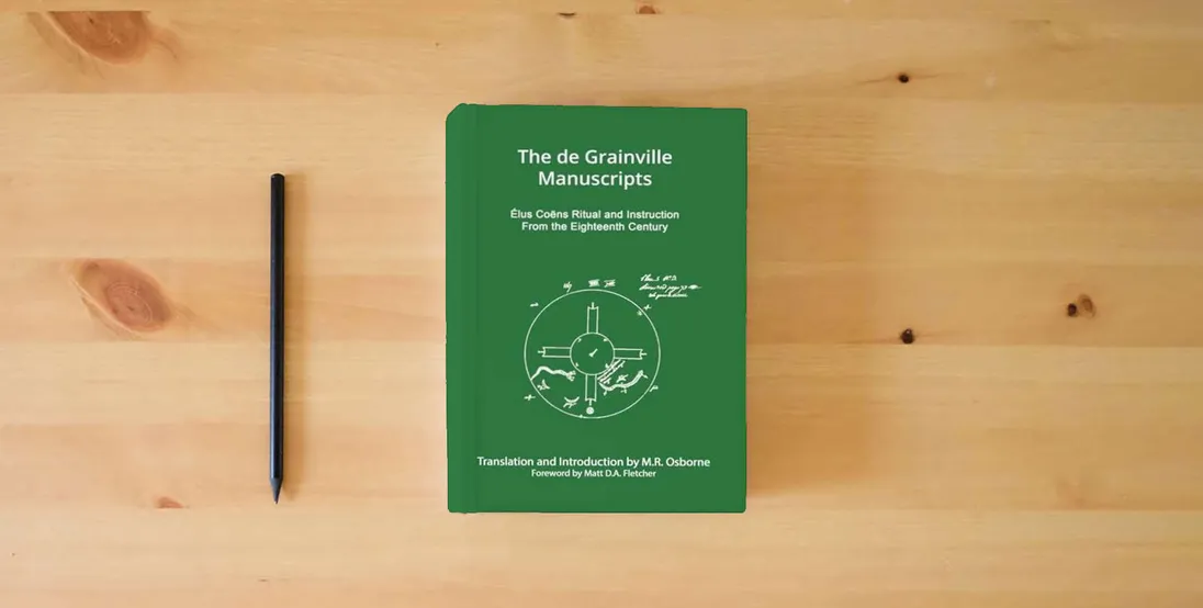 The book The de Grainville Manuscripts: Élus Coëns Ritual and Instruction from the Eighteenth Century (The Élus Coëns Library)} is on the table