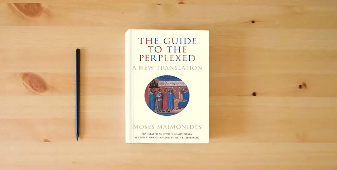 The book The Guide to the Perplexed: A New Translation} is on the table