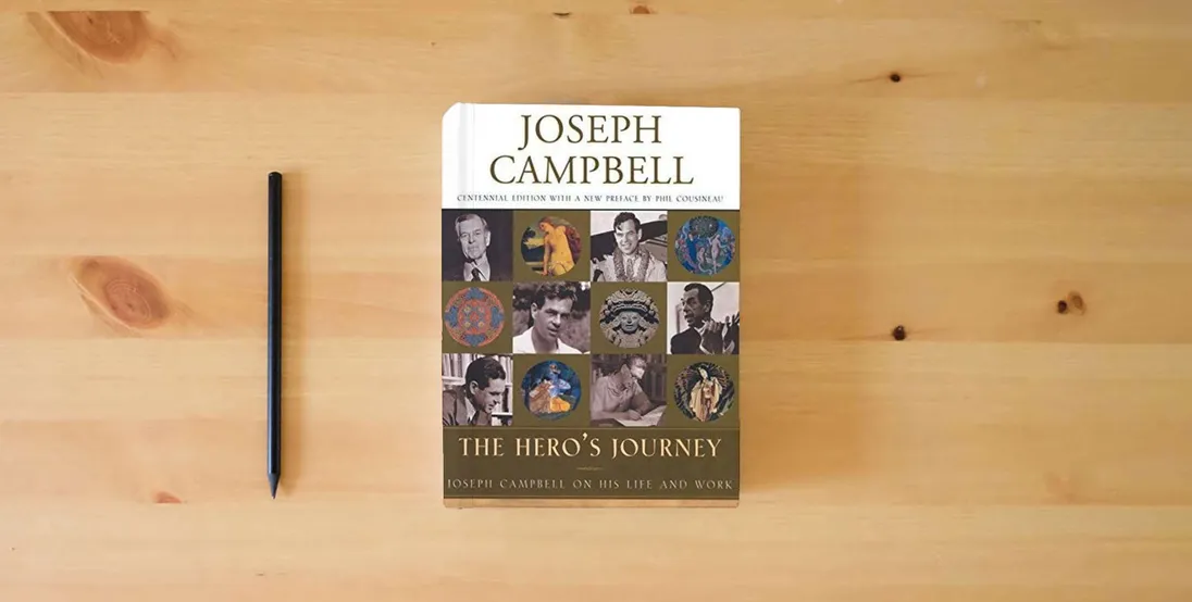 The book The Hero's Journey: Joseph Campbell on His Life and Work (The Collected Works of Joseph Campbell)} is on the table