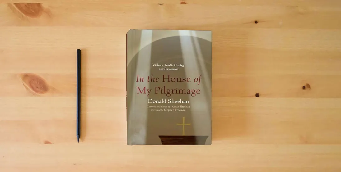 The book In the House of My Pilgrimage: Violence, Noetic Healing, and Personhood} is on the table