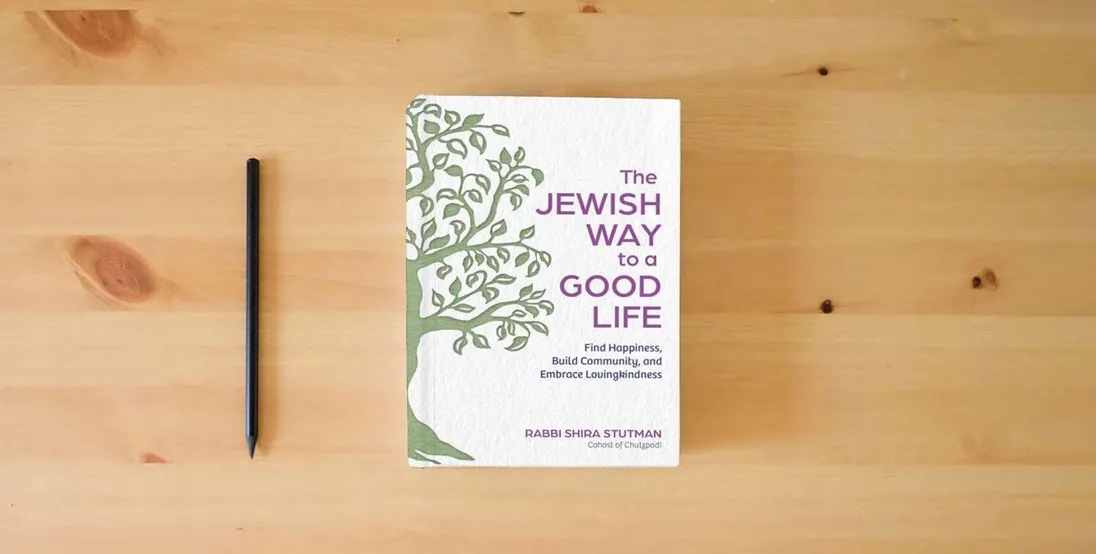 The book The Jewish Way to a Good Life: Find Happiness, Build Community, and Embrace Lovingkindness} is on the table