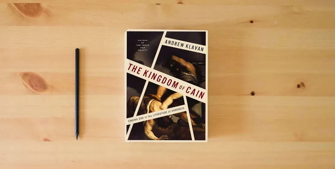 The book The Kingdom of Cain: Finding God in the Literature of Darkness} is on the table