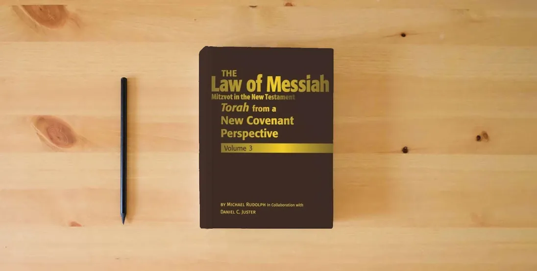 The book The Law of Messiah Volume 3: Torah from a New Covenant Perspective (The Law of Messiah: Torah from a New Covenant Perspective)} is on the table