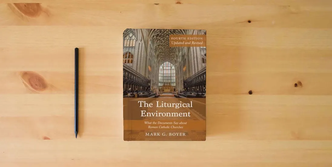 The book The Liturgical Environment, Fourth Edition, Updated and Revised: What the Documents Say about Roman Catholic Churches} is on the table