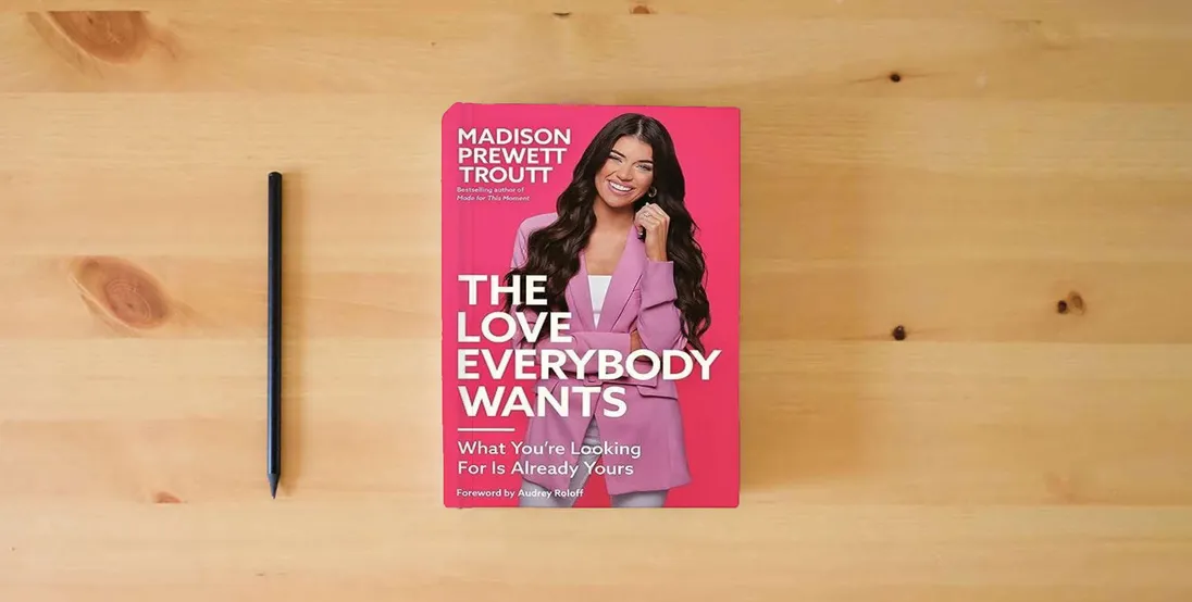 The book The Love Everybody Wants: What You're Looking For Is Already Yours} is on the table