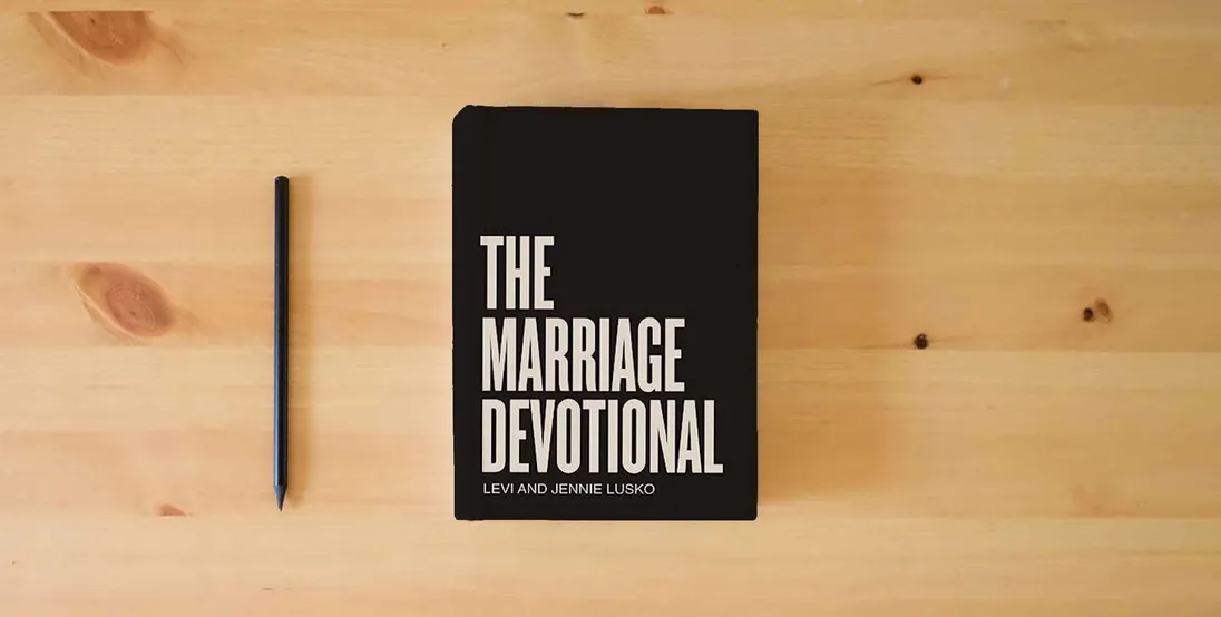 The book The Marriage Devotional: 52 Days to Strengthen the Soul of Your Marriage} is on the table