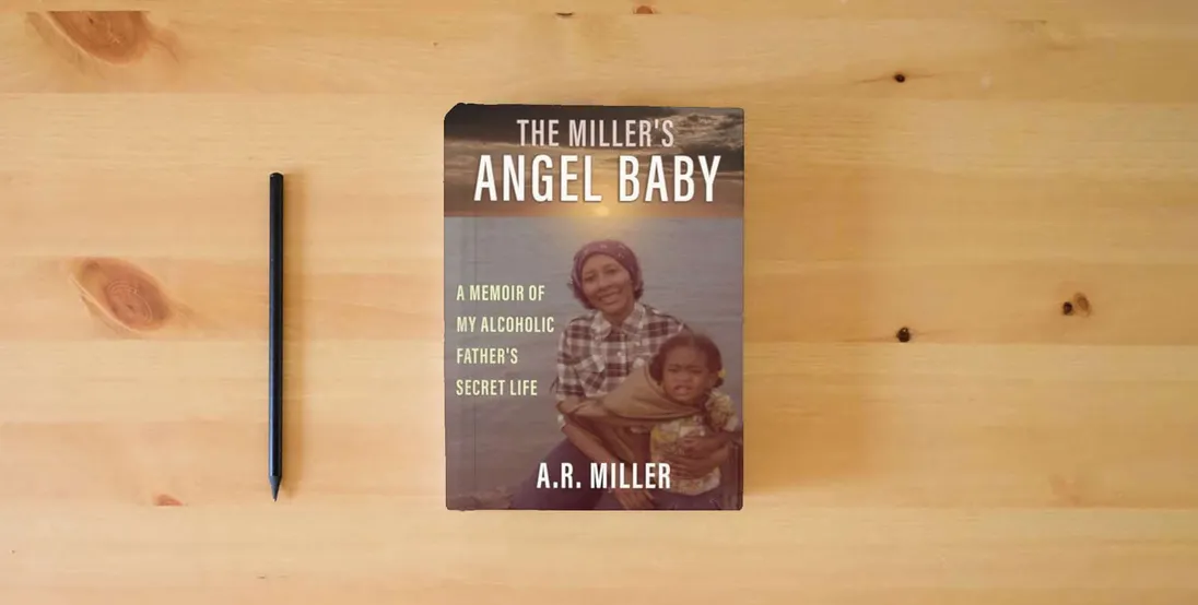The book The Miller's Angel Baby: A Memoir of My Alcoholic Father’s Secret Life} is on the table