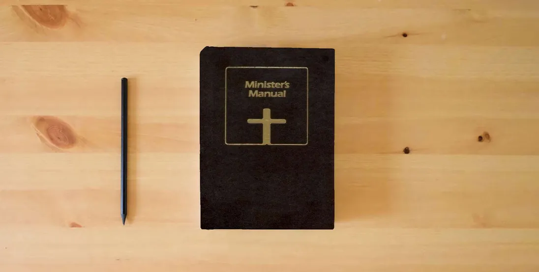 The book The Ministers Manual (NIV)} is on the table