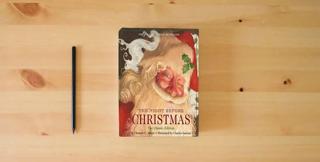 The book The Night Before Christmas Hardcover: The Classic Edition, The New York Times Bestseller (Christmas Book)} is on the table