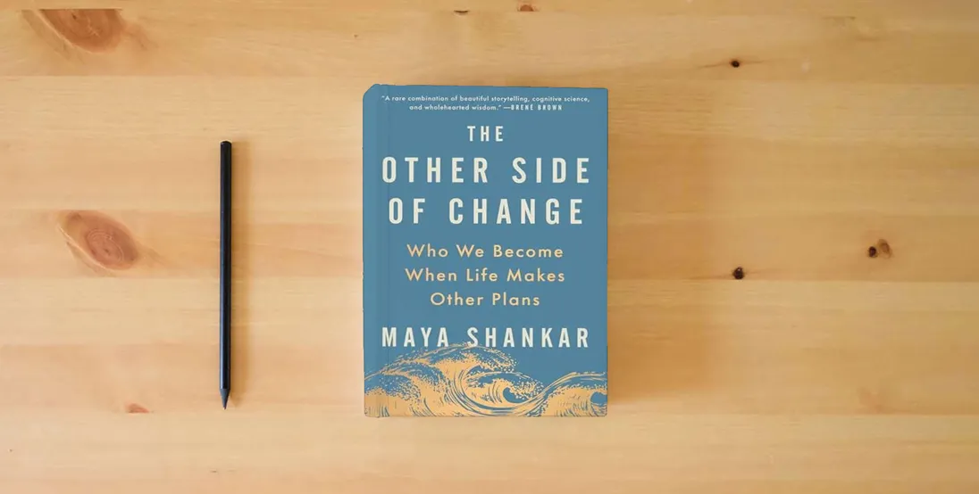 The book The Other Side of Change: Who We Become When Life Makes Other Plans} is on the table