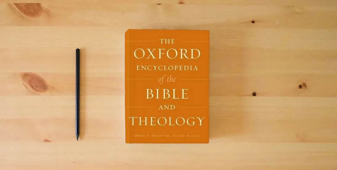 The book The Oxford Encyclopedia of the Bible and Theology: Two-Volume Set (Oxford Encyclopedias of the Bible)} is on the table