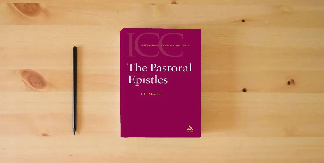 The book The Pastoral Epistles (International Critical Commentary)} is on the table