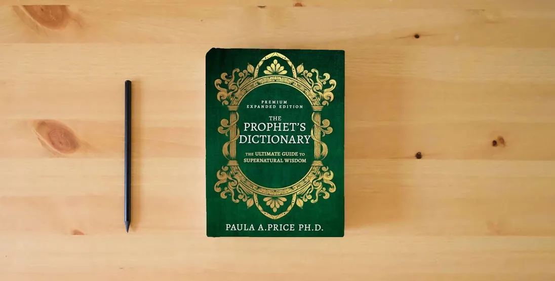 The book The Prophet's Dictionary: The Ultimate Guide to Supernatural Wisdom (Premium Expanded Edition)} is on the table