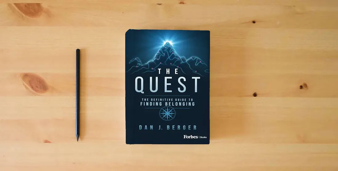 The book The Quest: The Definitive Guide to Finding Belonging} is on the table