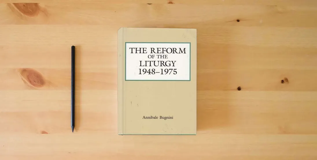 The book The Reform of the Liturgy (1948-1975)} is on the table