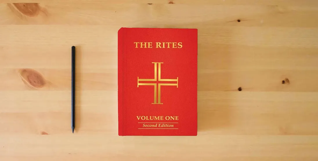 The book The Rites of the Catholic Church: Volume One, Second Edition} is on the table