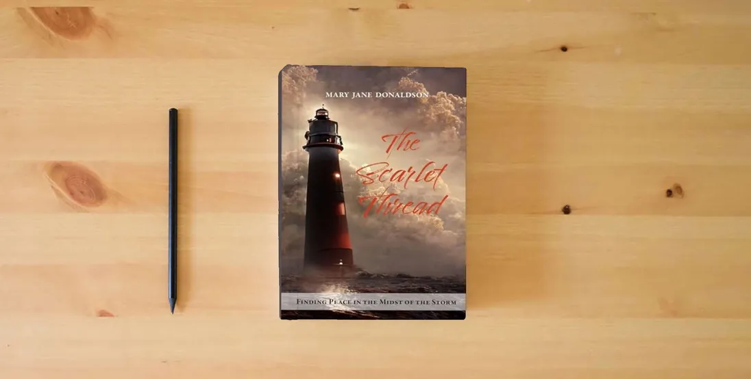 The book The Scarlet Thread} is on the table